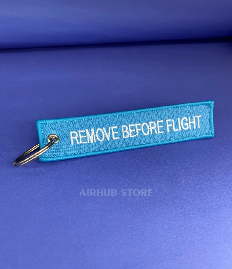 Remove Before Flight aqua Keychain