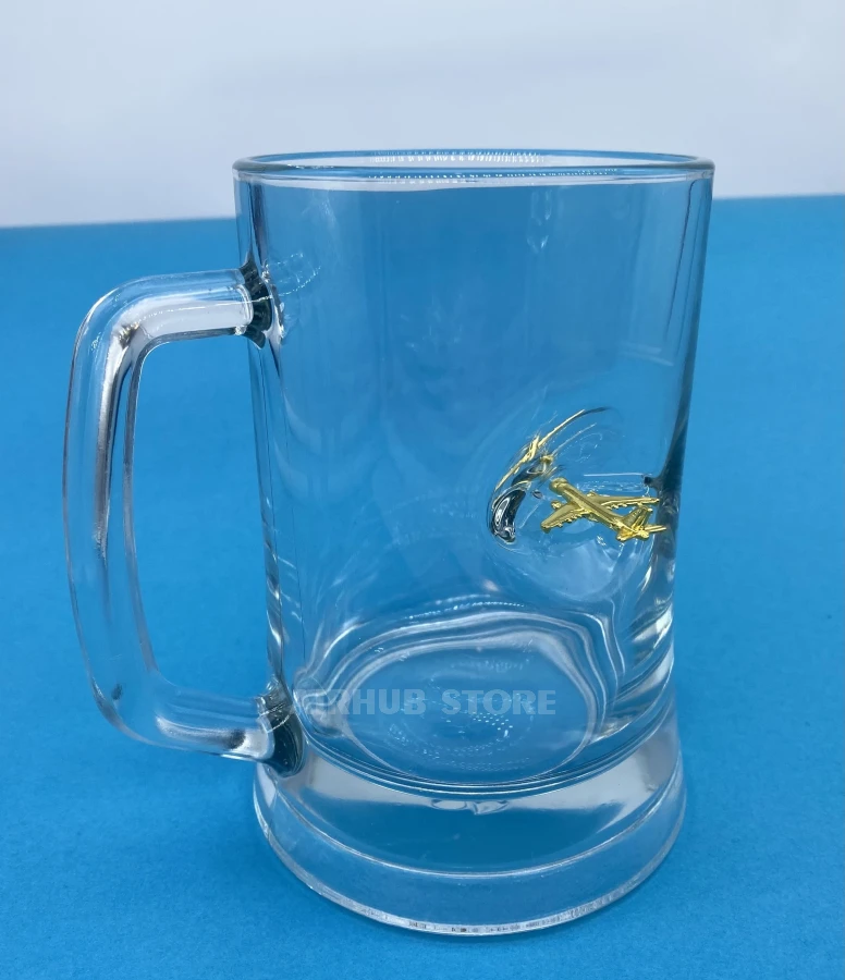Beer glass with an airplane