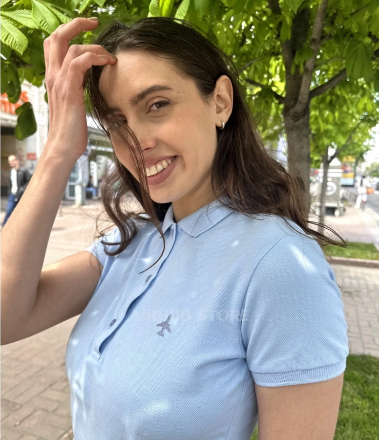 Blue minimalist polo with airplane