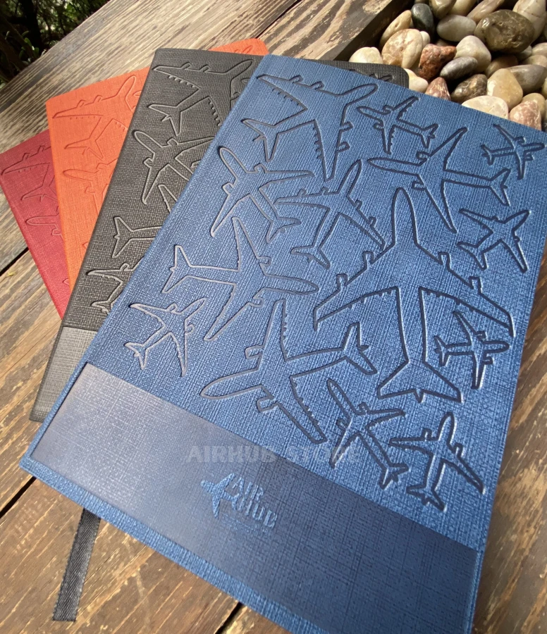 Notebook with airplanes