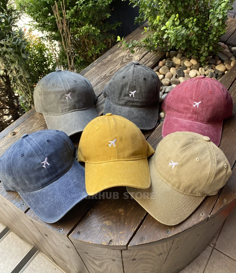 Cap made of boiled cotton with an airplane