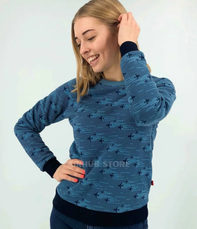 Blue sweatshirt trail of airplanes