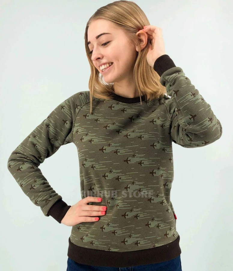 Khaki sweatshirt trail of airplanes