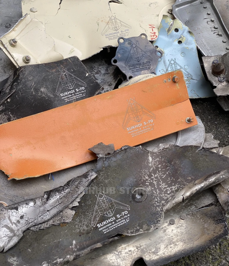 A damage piece of the downed Russian Sukhoi S-70 Okhotnik-B drone